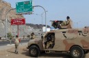 Yemeni soldiers secure a main road in th