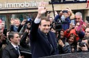 French presidential election candidate Emmanuel Macron, head of the political movement En Marche !, or Onwards ! greets supporters as leaves his residence during the the second round of 2017 French presidential election, in Le Touquet