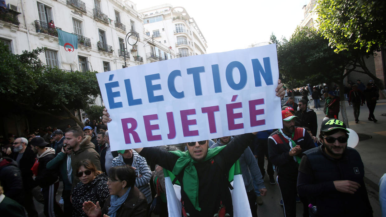 2019-12-12T130344Z_1784924424_RC2PTD9257LV_RTRMADP_3_ALGERIA-ELECTION-PROTESTS