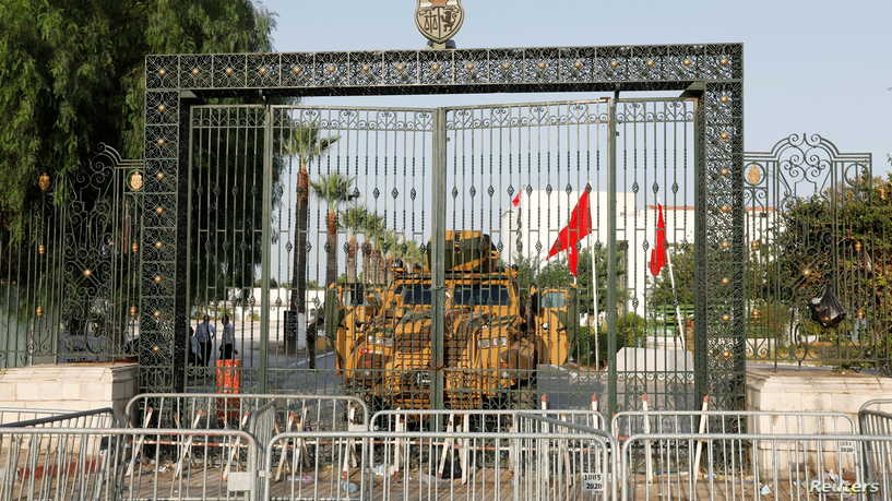 A military vehicle is pictured in front of the parliament building in Tunis